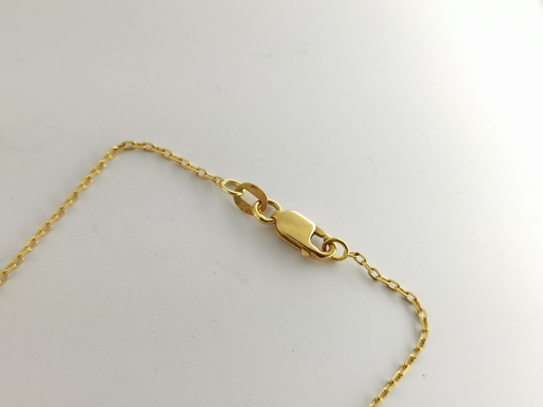 18K Goldkette mit Grünen Steine