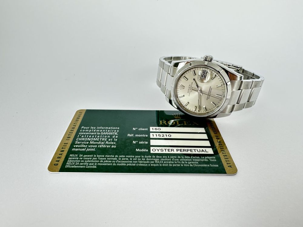 Rolex Oyster Perpetual Date - 115210