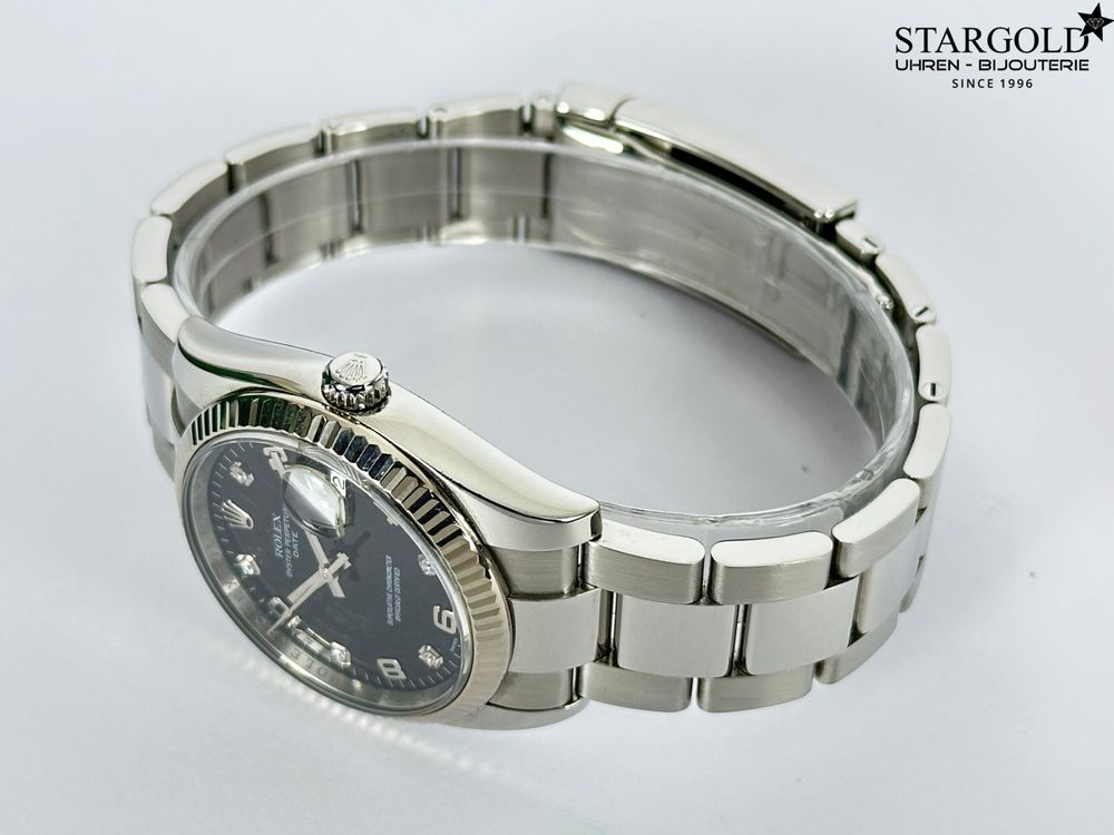 Rolex Oyster Perpetual Date - 115234