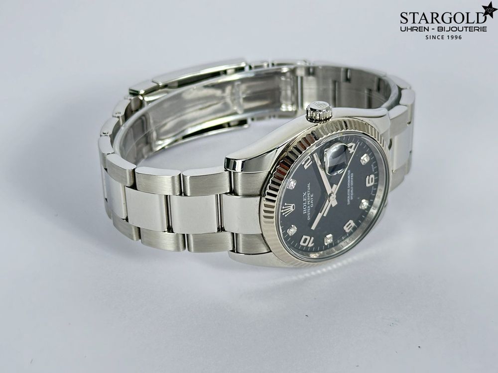Rolex Oyster Perpetual Date - 115234