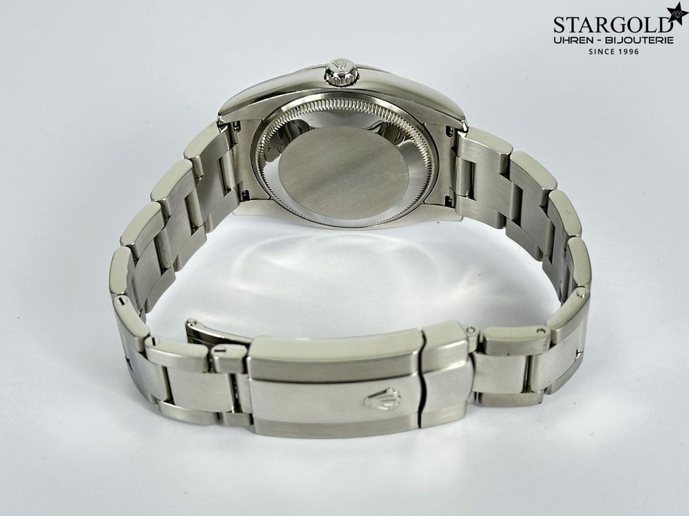 Rolex Oyster Perpetual Date - 115234