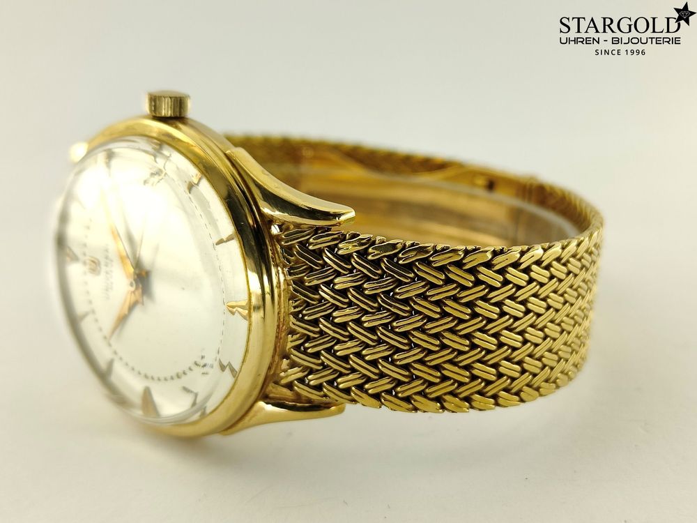 Universal Geneve Handaufzug - 18K Gelbgold