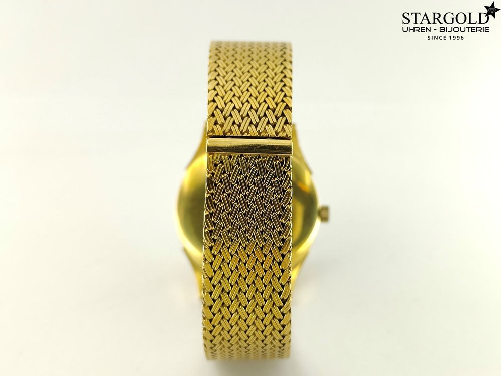 Universal Geneve Handaufzug - 18K Gelbgold