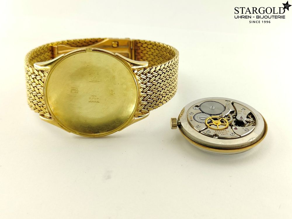 Universal Geneve Handaufzug - 18K Gelbgold