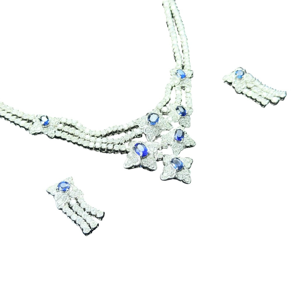 18K Weissgold Set mit Diamanten und Saphiren auf Stargold.ch erhältlich.