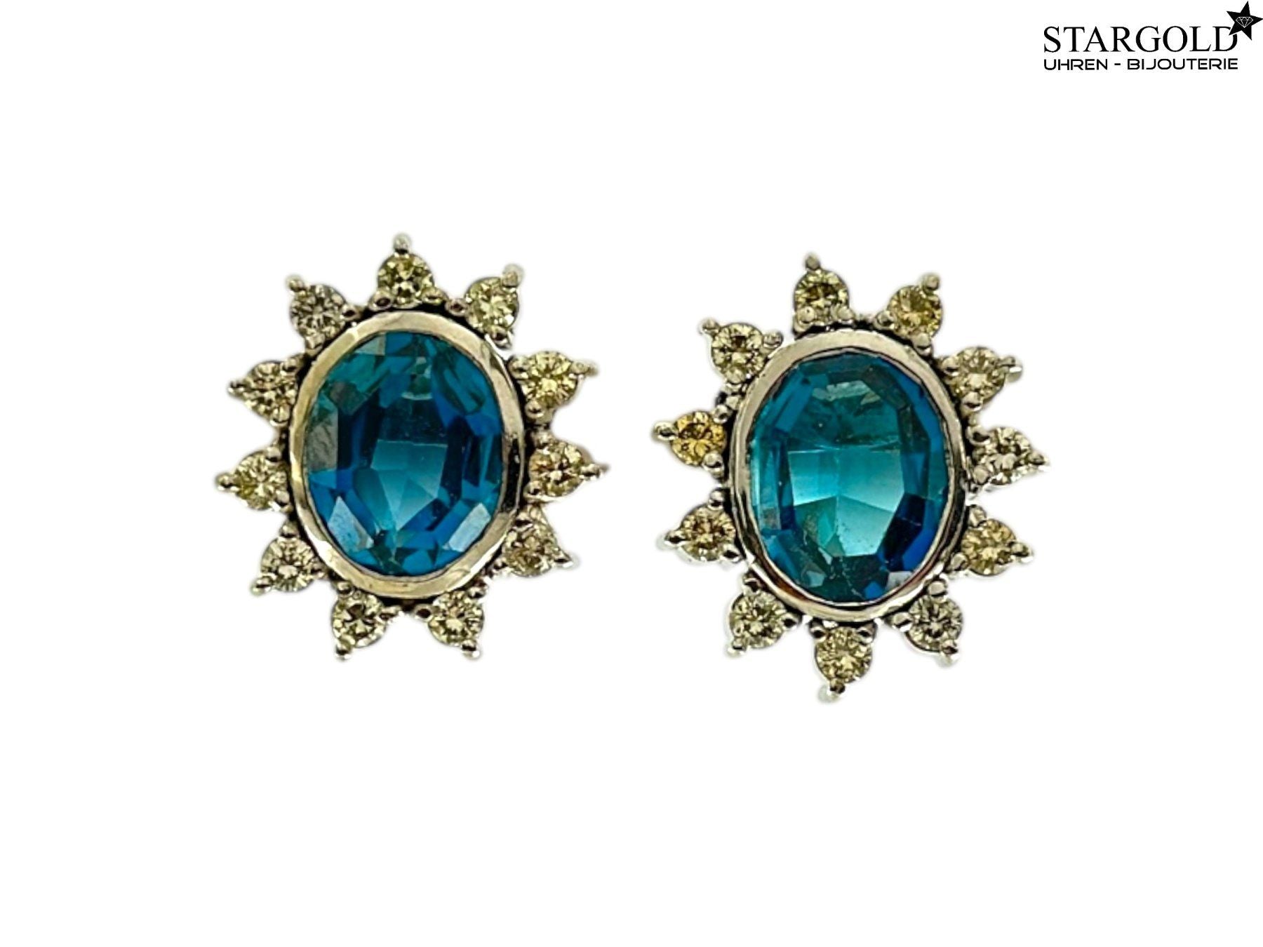 Ohrring 18K Weissgold mit Diamanten & Blautopas stargold.ch