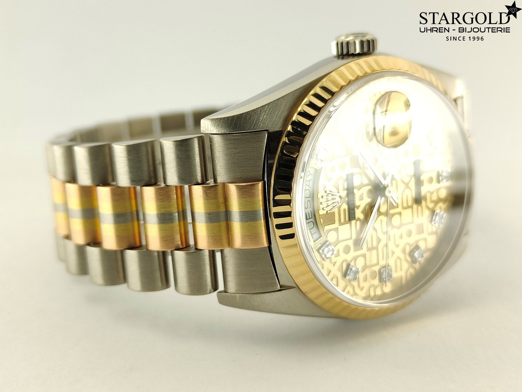 Rolex Day-Date 36 Tridor 18K Gold - 18239BIC