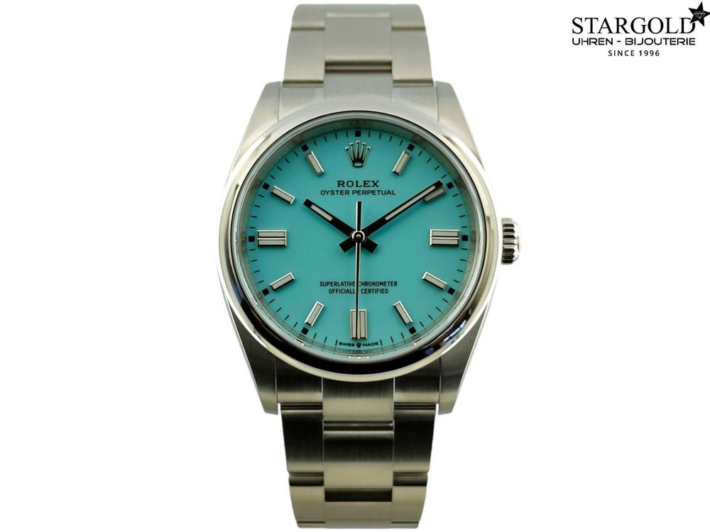 Rolex Oyster Perpetual Tiffany 36 126000 with box & papers